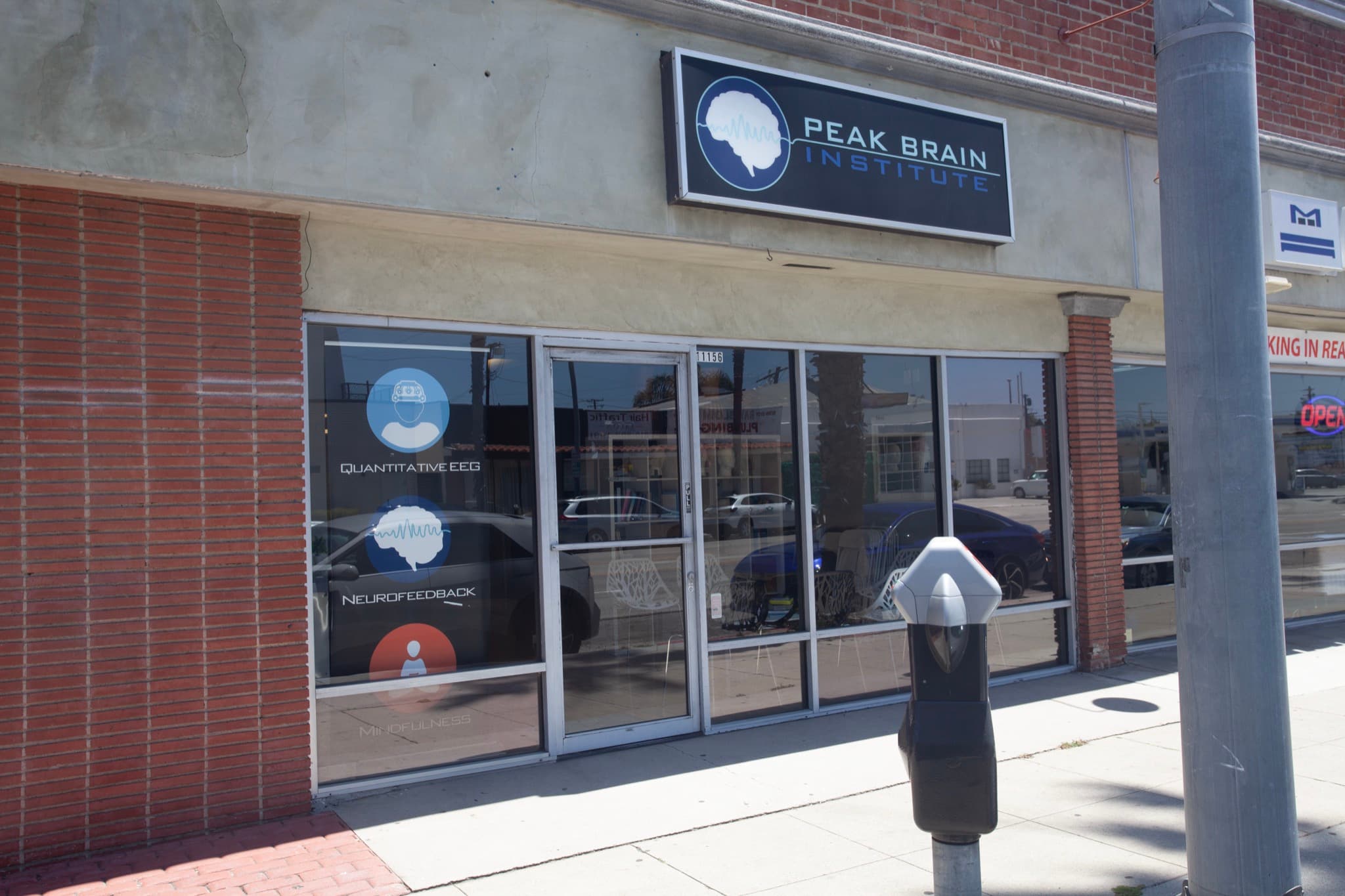 Peak Brain Institute branding in the Culver City storefront window